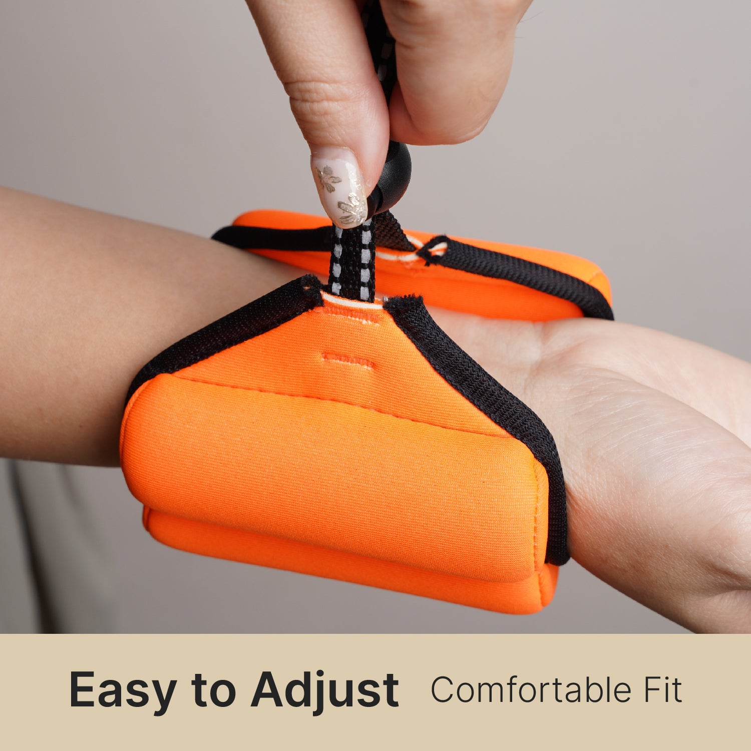 Catalyst Orange Wrist Floating Lanyard adjusts on wrist easily